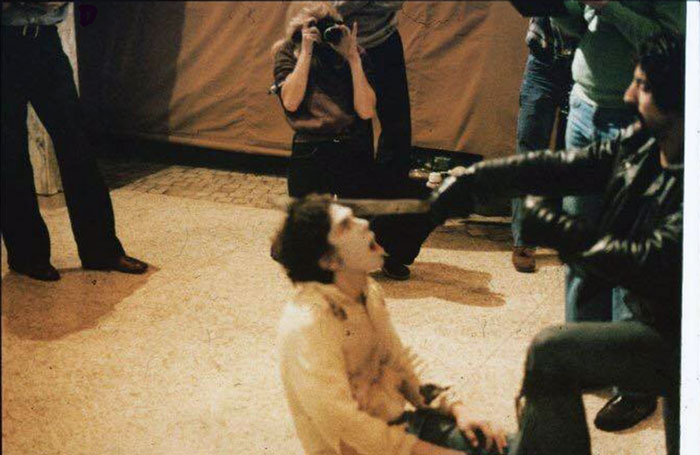 Behind the scenes photo of Tom Savini shooting and Lenny Lies machete scene